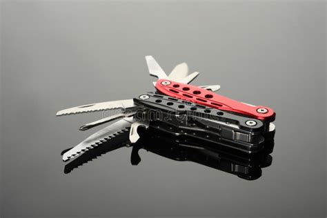 Modern Compact Portable Multitool On Grey Table Stock Photo Image Of