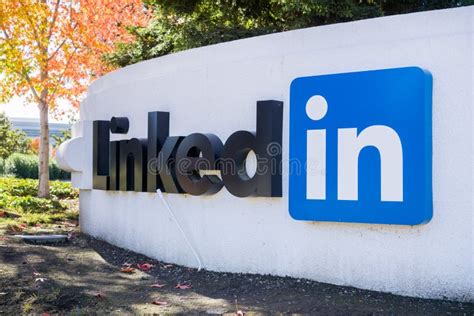 Linkedin Sign And Logo On Glass Facade Of Professional Networking