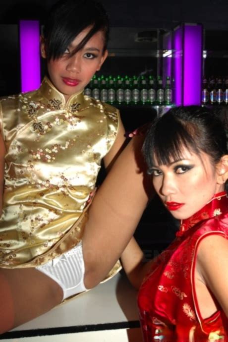 Thai Lesbians Mintra And Sherri Lose Their Traditional Outfits Pose