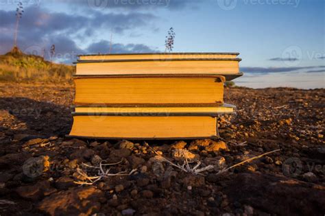 Stacked books on the ground 17470773 Stock Photo at Vecteezy