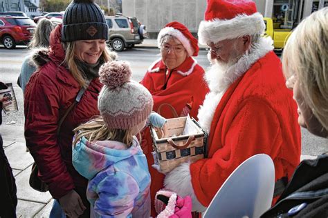 Charitable Joy Santa And Mrs Claus Donate Earnings To Charity