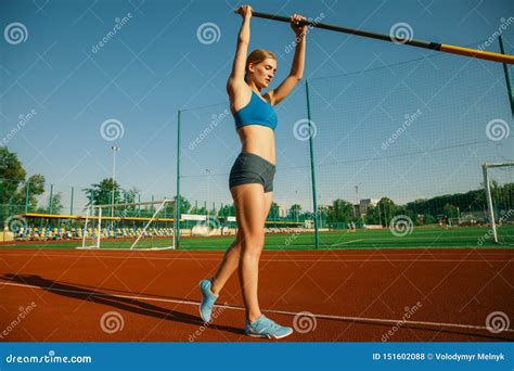 Female High Jumper Training at the Stadium in Sunny Day Stock Photo ...