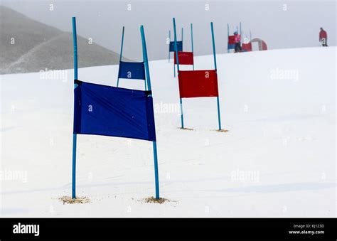 Children Skiing Slalom Racing Track With Blue And Red Gates Small Ski