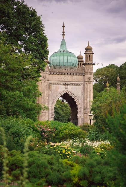 Premium Photo | A garden with a green dome and flowers in the foreground