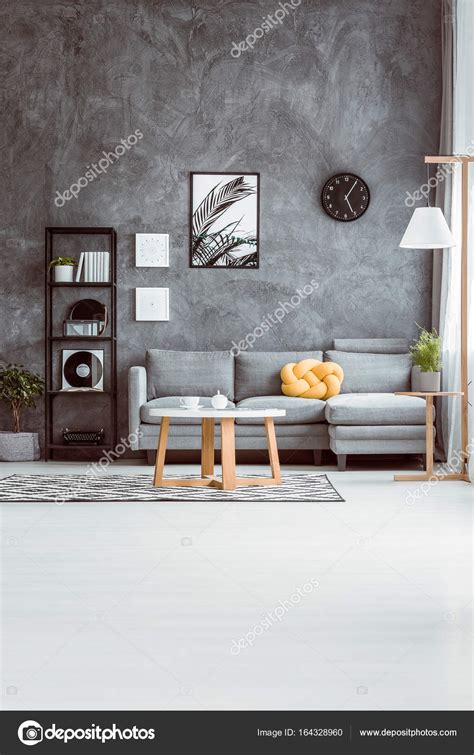 Living room with concrete wall — Stock Photo © photographee.eu #164328960