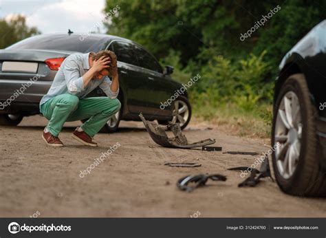 upset male drivers car accident road automobile crash broken automobile