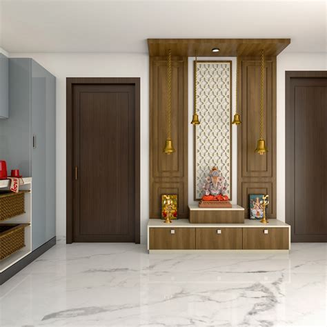 Modern Pooja Room Design With Bells And Drawer Livspace