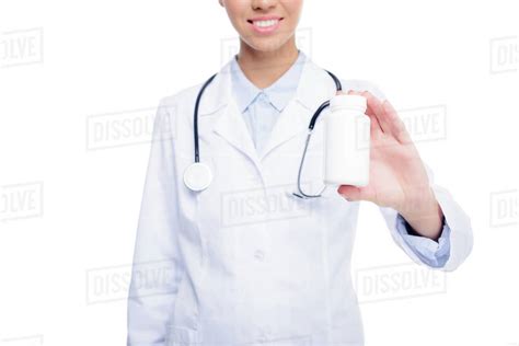 Cropped View Of Female Doctor In White Coat With Pill Bottle Isolated