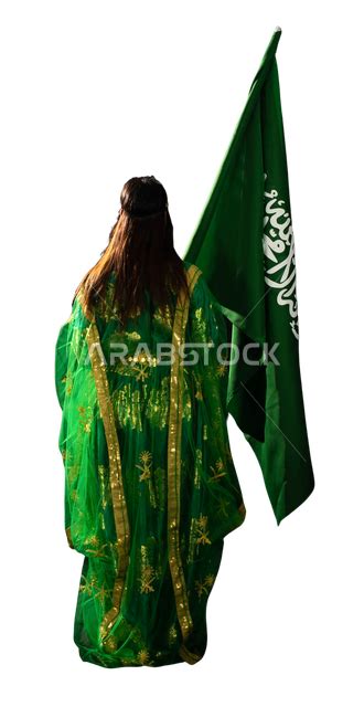 Portrait From The Back Of A Saudi Arabian Gulf Woman Raising The Flag