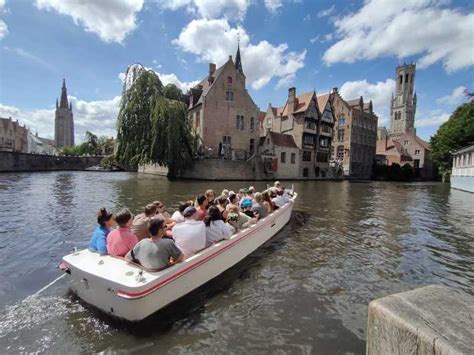 Bruges Small Group Boat Cruise And Guided Walking Tour Getyourguide