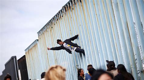 Caravan Of Central American Asylum Seekers Arrive At Us Border Wall