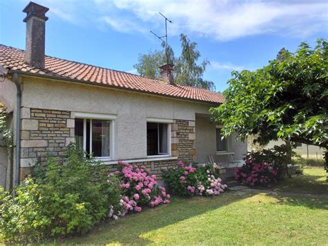 vente Maison de plain pied avec garage et jardin arboré