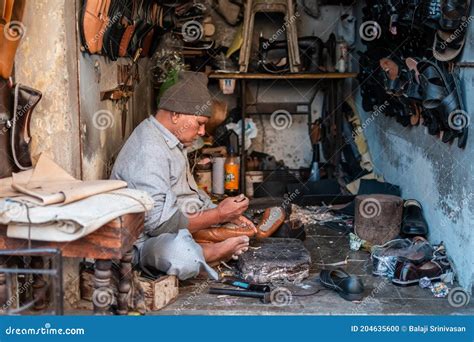 An Indian Cobbler At Work In His Shop Editorial Image Image Of Local