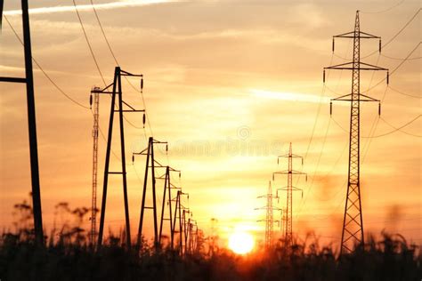 Electricity Towers At Sunset Stock Photo Image Of Metal Landscape