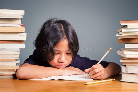 Child Lazy to do Homework stock image. Image of female - 179190651