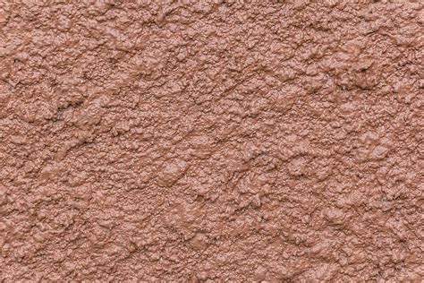 Oilpainted Texture On Plaster Wall With Brown Bumps Photo Background