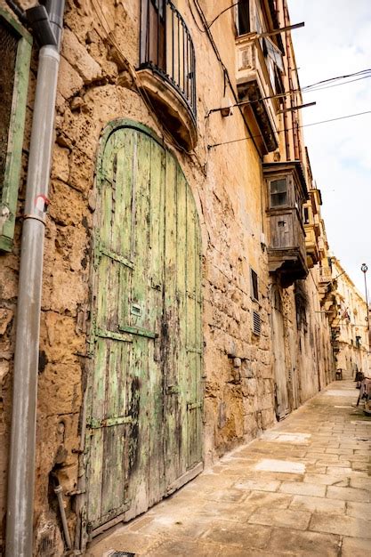 Premium Photo Traditional Houses With Colorful Wooden Balconies In Malta