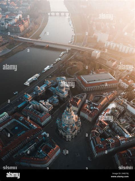 Aerial shot of The Dresden Frauenkirche surrounded by buildings in ...