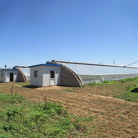 Chinese Solar Greenhouse Double Arch Galvanized Steel Structure Waterproof Warm Quilt Cold