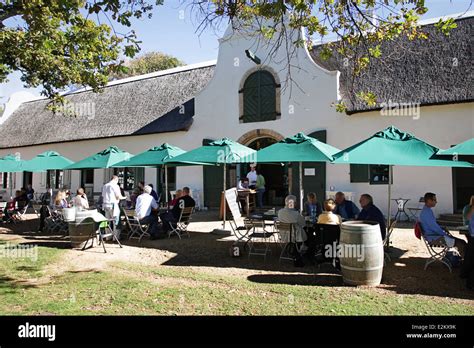 People dining outdoors at Jonkershuis Restaurant, Groot Constantia Stock Photo, Royalty Free ...