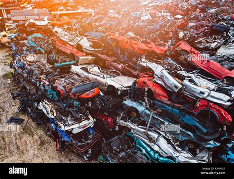 Destroyed Scrapped Cars Stacked On A Scrap Yard Car Recycling Stock