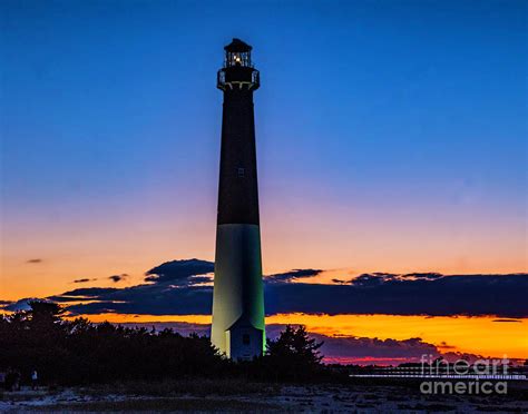 Sunset At The Lighthouse In Barnegat Photograph By Nick Zelinsky Jr