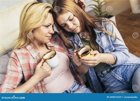 Mother And Daughter Drink Tea Or Coffee Stock Image Image Of Gossip