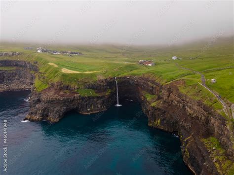 Beautiful Aerial View Of Gasadalur Waterfall And Village And Landscapes