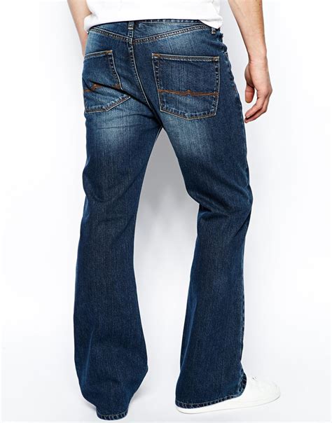 Lyst Asos Flare Jeans In Mid Wash In Blue For Men