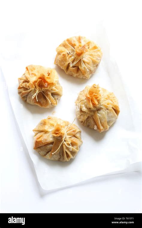 Phyllo Pastry Strudel With Apple Filling And Sultana Grapes Dusted