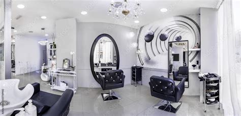 Panorama of a modern bright beauty salon. Hair salon interior business ...