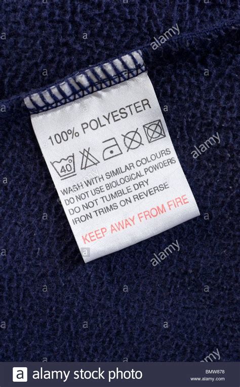 Polyester Clothes Wash Care Instructions Label England UK Stock Photo