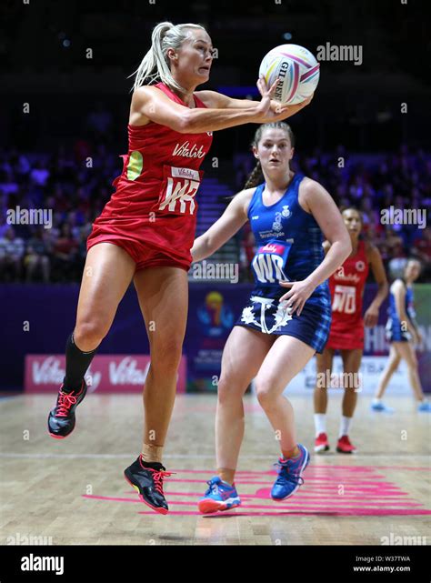 England S Chelsea Pitman Left And Scotland S Emily Nicholl Battle For