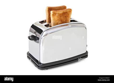 Old style chrome toaster with toast Stock Photo - Alamy