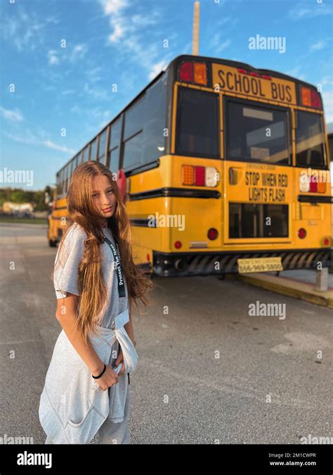 Beautiful Teen Girl Getting On School Bus Stock Photo Alamy