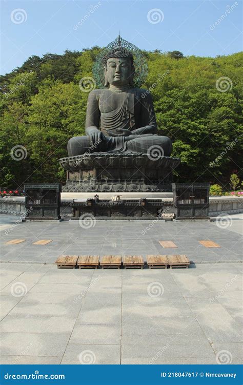 Large Bronze Buddha Statue At The Sinheung Sa Temple In Seoraksan