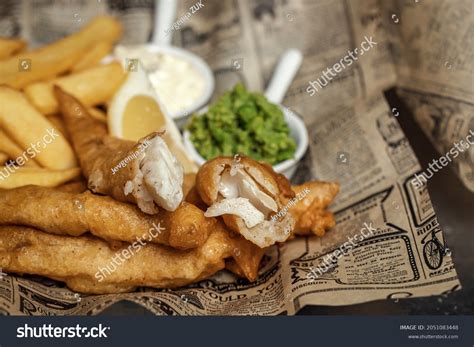 british traditional crispy fish chips mashed stock photo