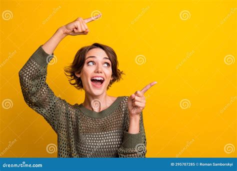 Photo Of Excited Glad Girl Wear Stylish Clothes Two Arms Above Head Direct Empty Space Offer On