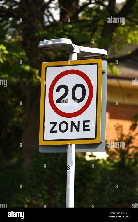 A 20mph Zone Road Sign In A School Area Of A Town The New Speed Limit