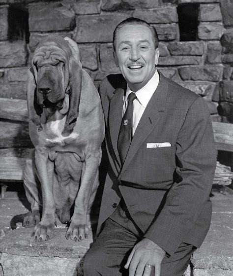 Walt-Disney-and-a-dog,-c.-1959;-Courtesy-of-the-Walt-Disney-Archives-Photo-Library-(c)-Disney - D23