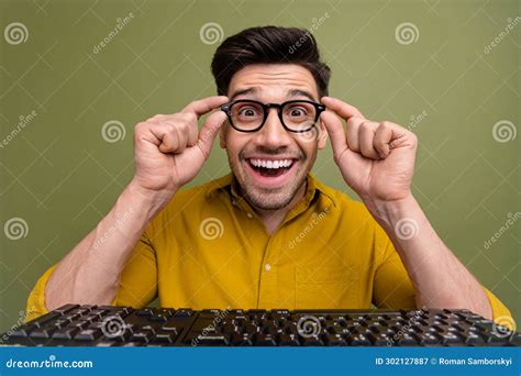 Photo Of Excited Cheerful Positive Man Wear Yellow Stylish Clothes Hold