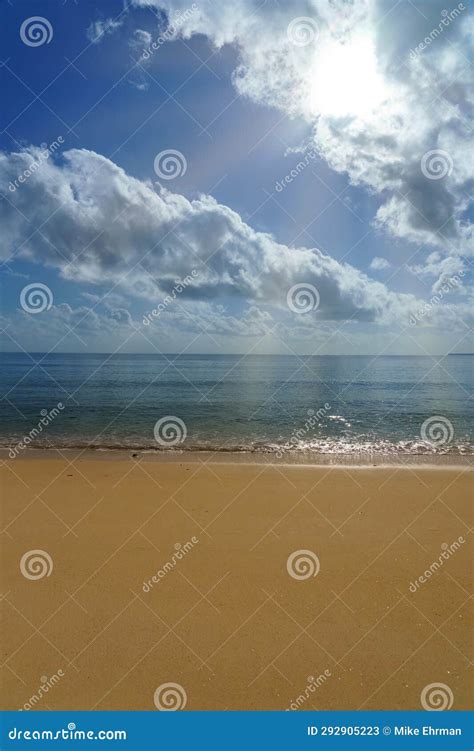 Coastal Island Beach Sandsky Clouds And Distant Horizon Stock Image