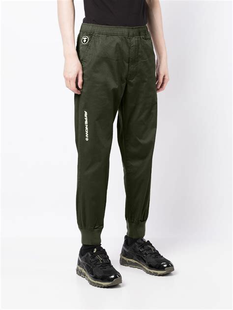 Aape By A Bathing Ape® Aapenow Straight Leg Chino Grün Farfetch De