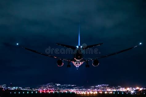 Jet Plane Landing Scene in the Night Stock Image - Image of land ...