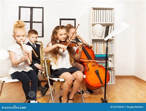 Cheerful Children Playing Musical Instruments Stock Photo - Image: 53755634