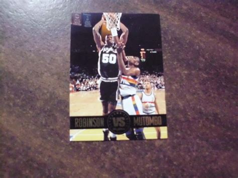 DAVID ROBINSON VS DIKEMBE MUTOMBO 1993 SKYBOX SHOWDOWN SERIES INSERT