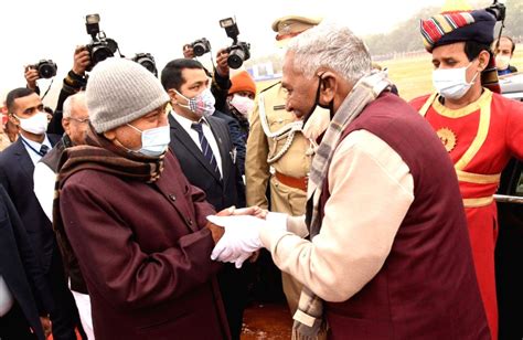 Bihar Governor Fagu Chauhan salutes after hoisting the National Flag ...