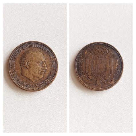 This Spanish coin have a 2,50 value (and the face of a dictator) : r ...