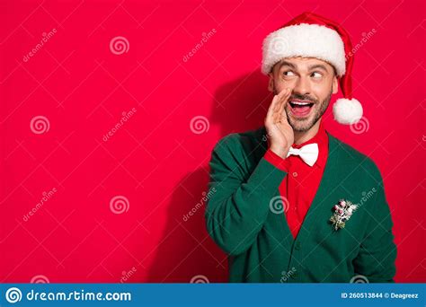 Photo Of Cheerful Excited Man Wear X Mas Green Cardigan Telling Secrets Getting Noel Presents