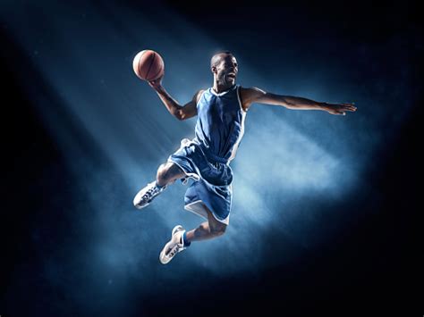 Basketball Player In Jump Shot Stock Photo - Download Image Now - iStock